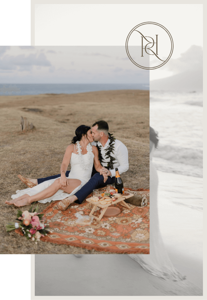 A couple sits on a picnic blanket in a field, sharing a kiss. There is champagne, a floral bouquet, and a tray of food. The scene is overlaid with a transparent beach image and a circular logo.