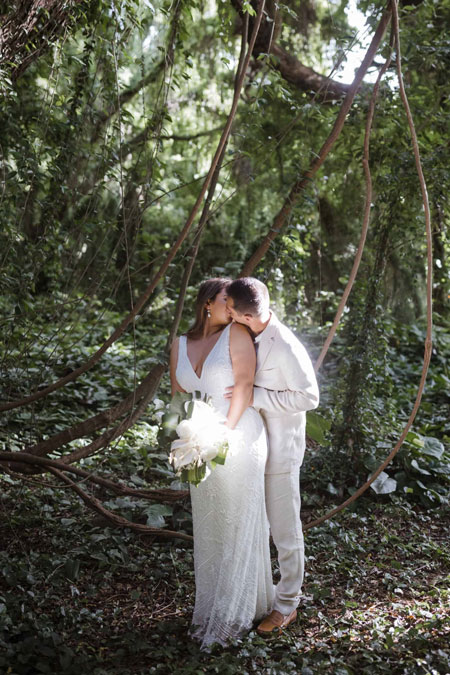 Roam Elopements, Maui Elopements, Bride and groom kissing under trees