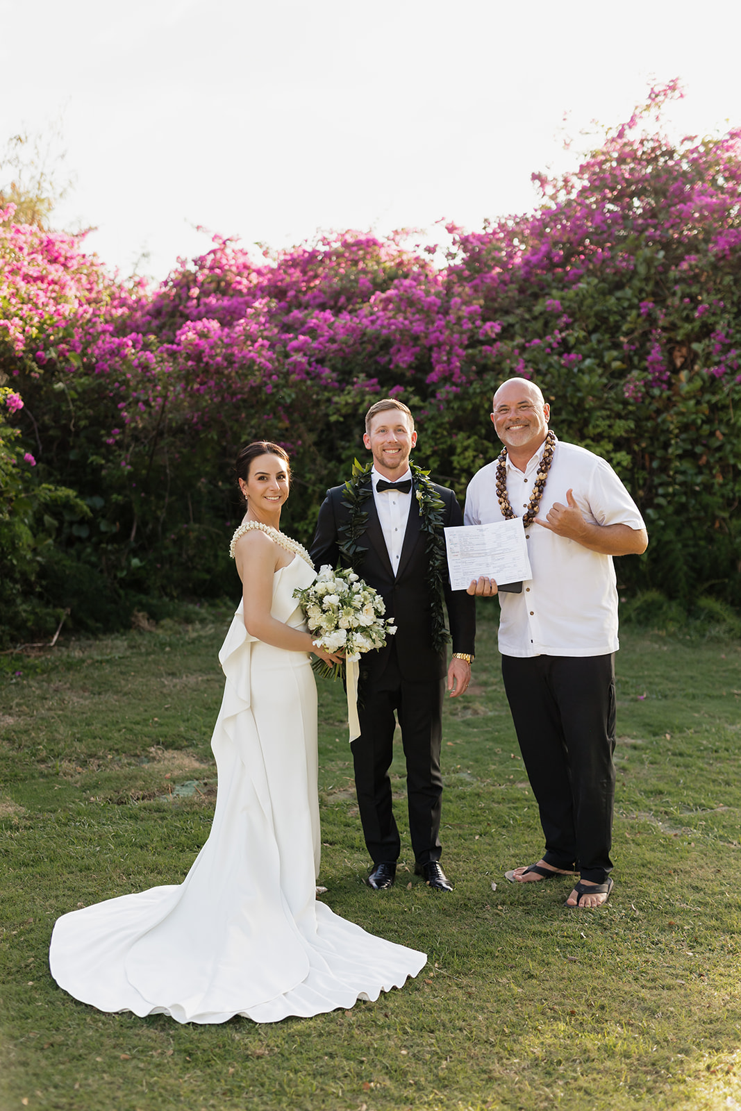 Roam Elopements, Maui Elopements, Bride, groom, and wedding officiant pose after ceremony.
