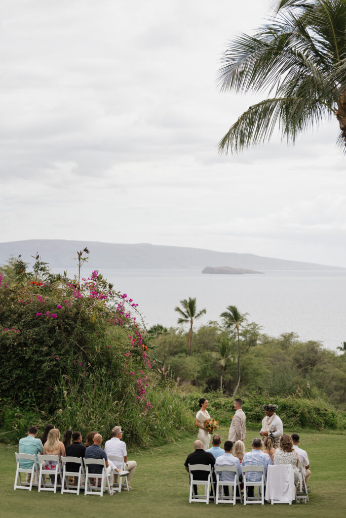 Roam Elopements, Maui Elopements, Outdoor wedding ceremony in Maui with ocean view and palm trees